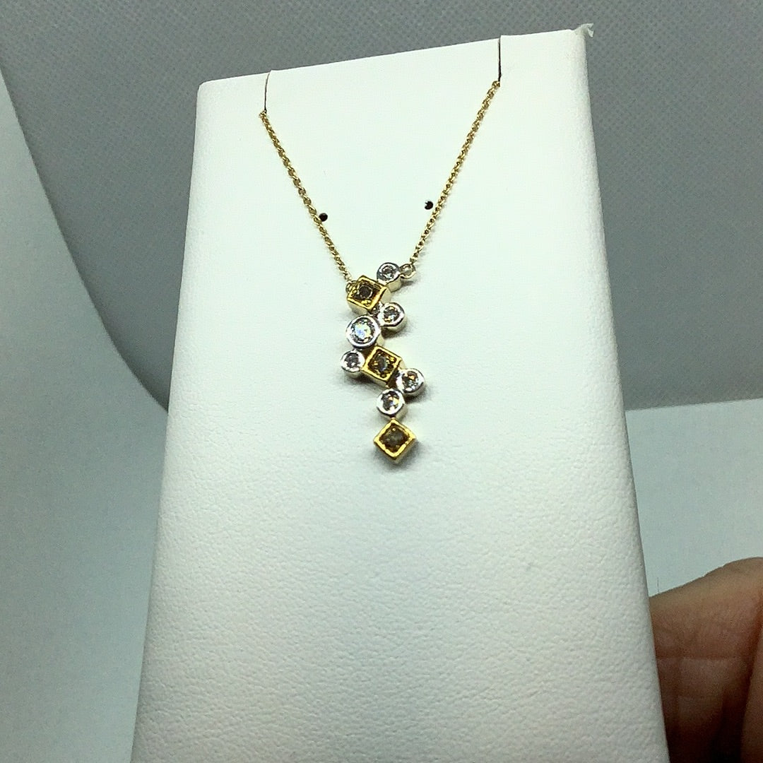 Fancy yellow diamond pendant