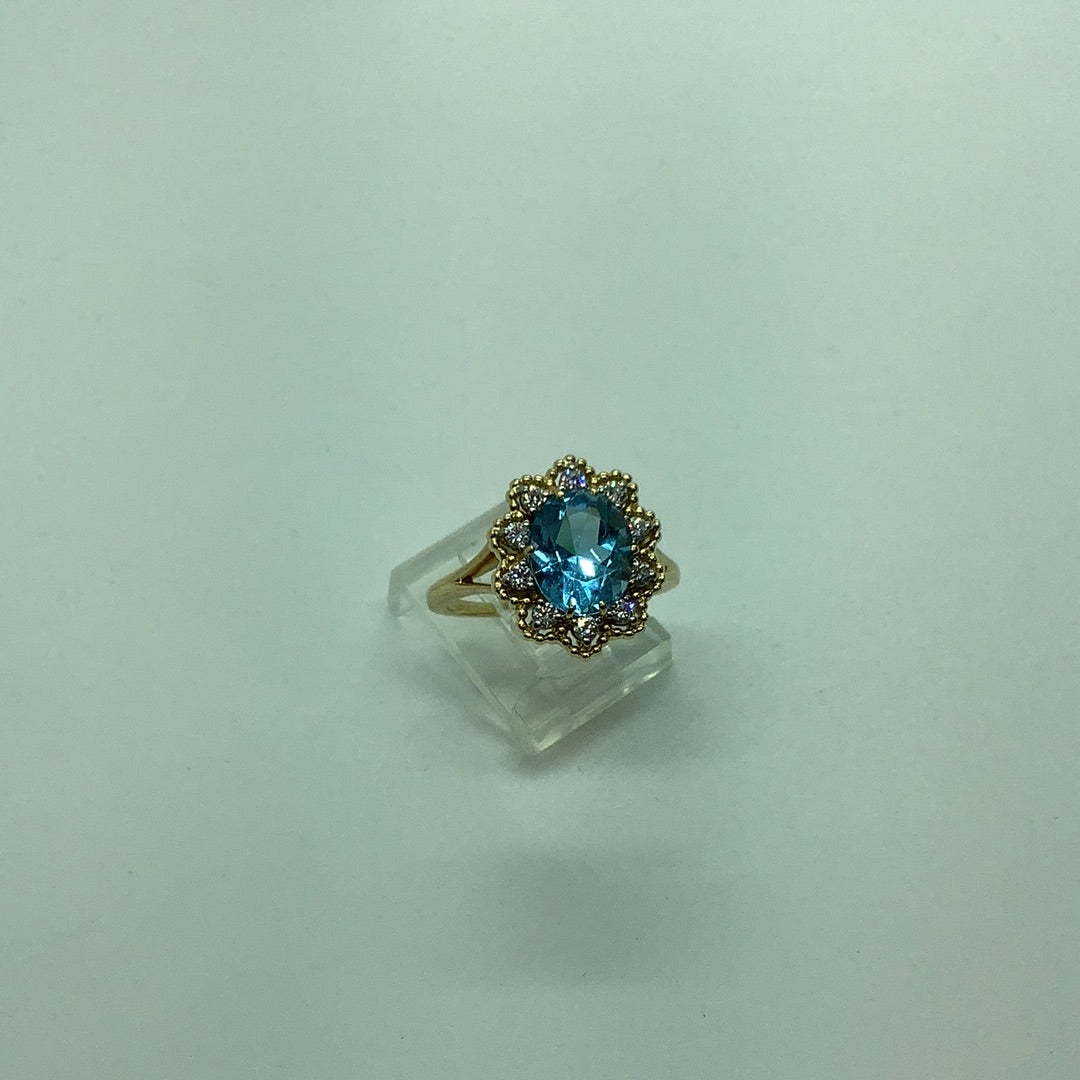 Blue topaz and diamond ring