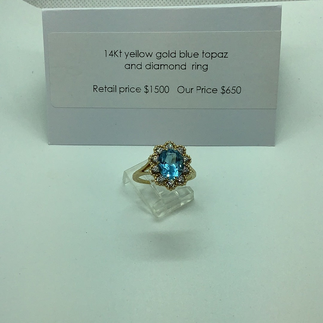 Blue topaz and diamond ring