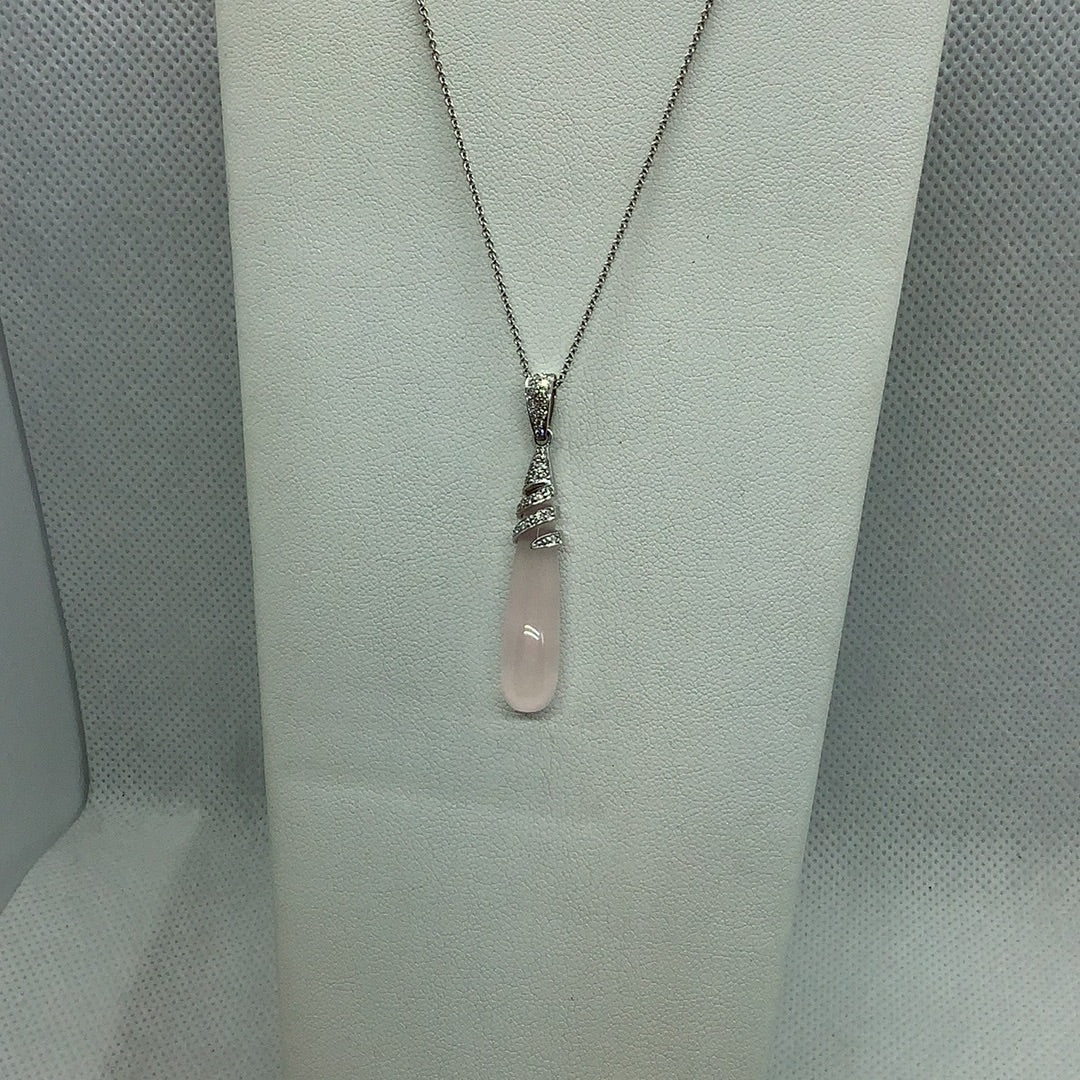Rose quartz and diamond pendant