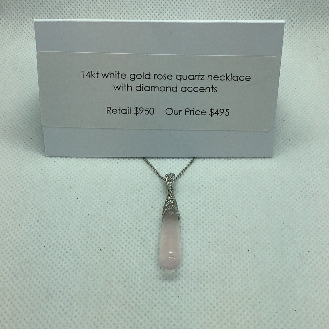 Rose quartz and diamond pendant