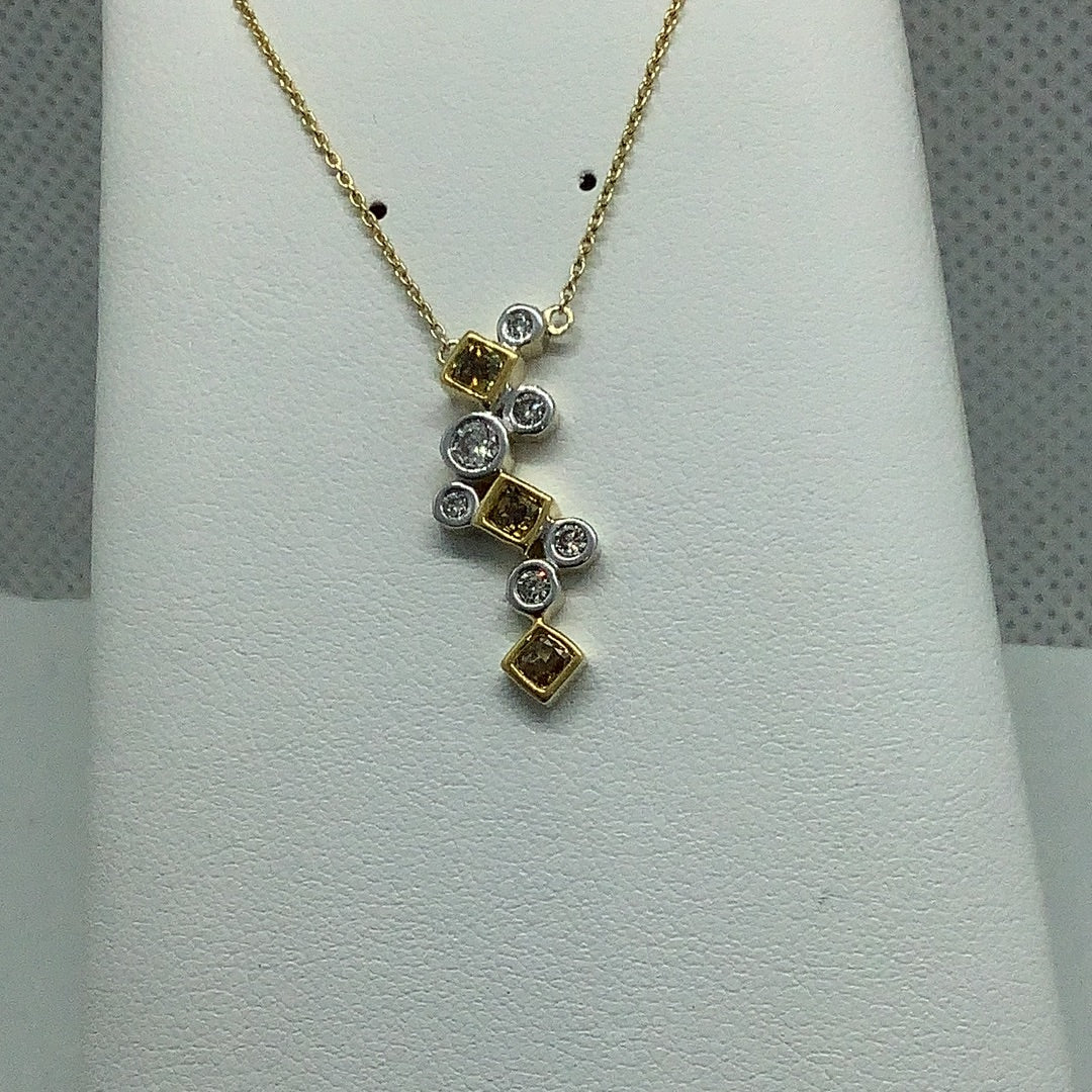 Fancy yellow diamond pendant
