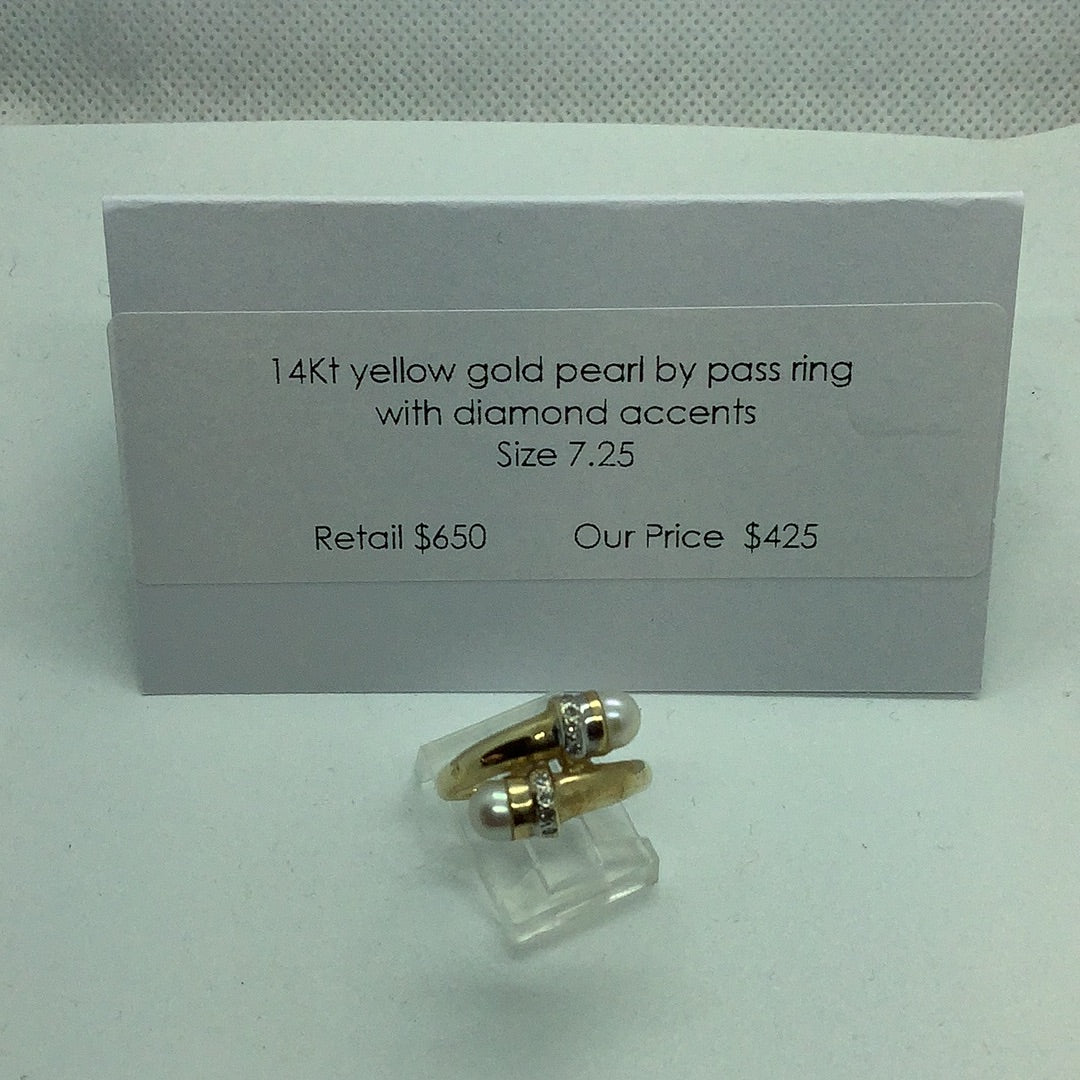 14 kt yellow gold pearl bypass ring with diamond accents