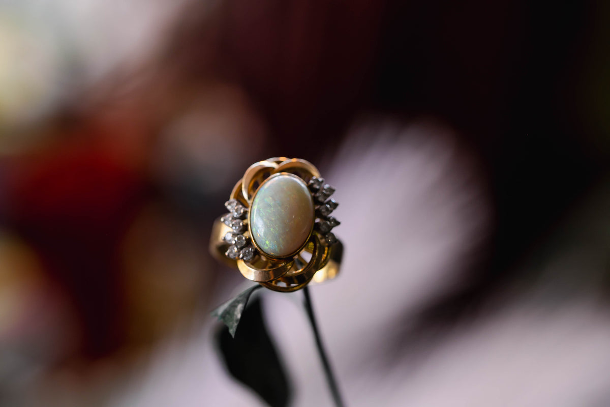 Opal and diamond ring