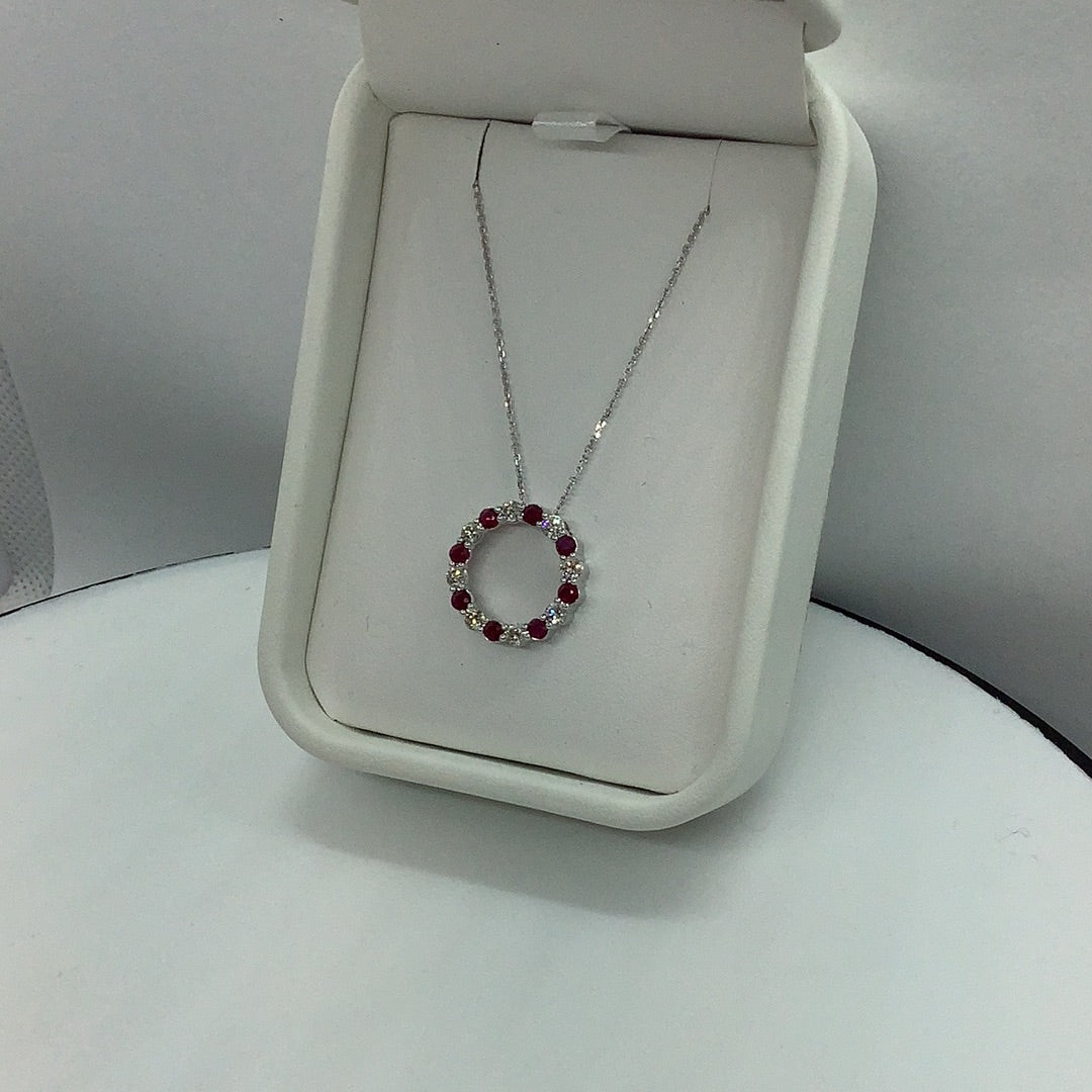 Ruby and diamond circle pendant