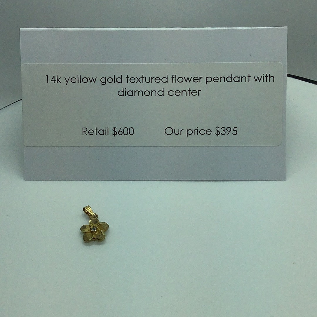 Gold flower pendant