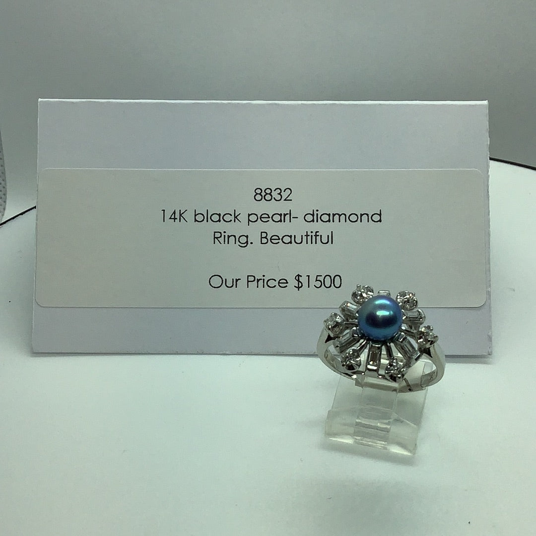 Black pearl and diamond ring