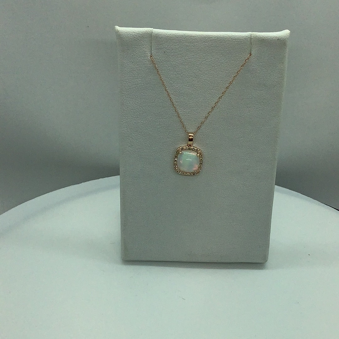 Opal and diamond pendant