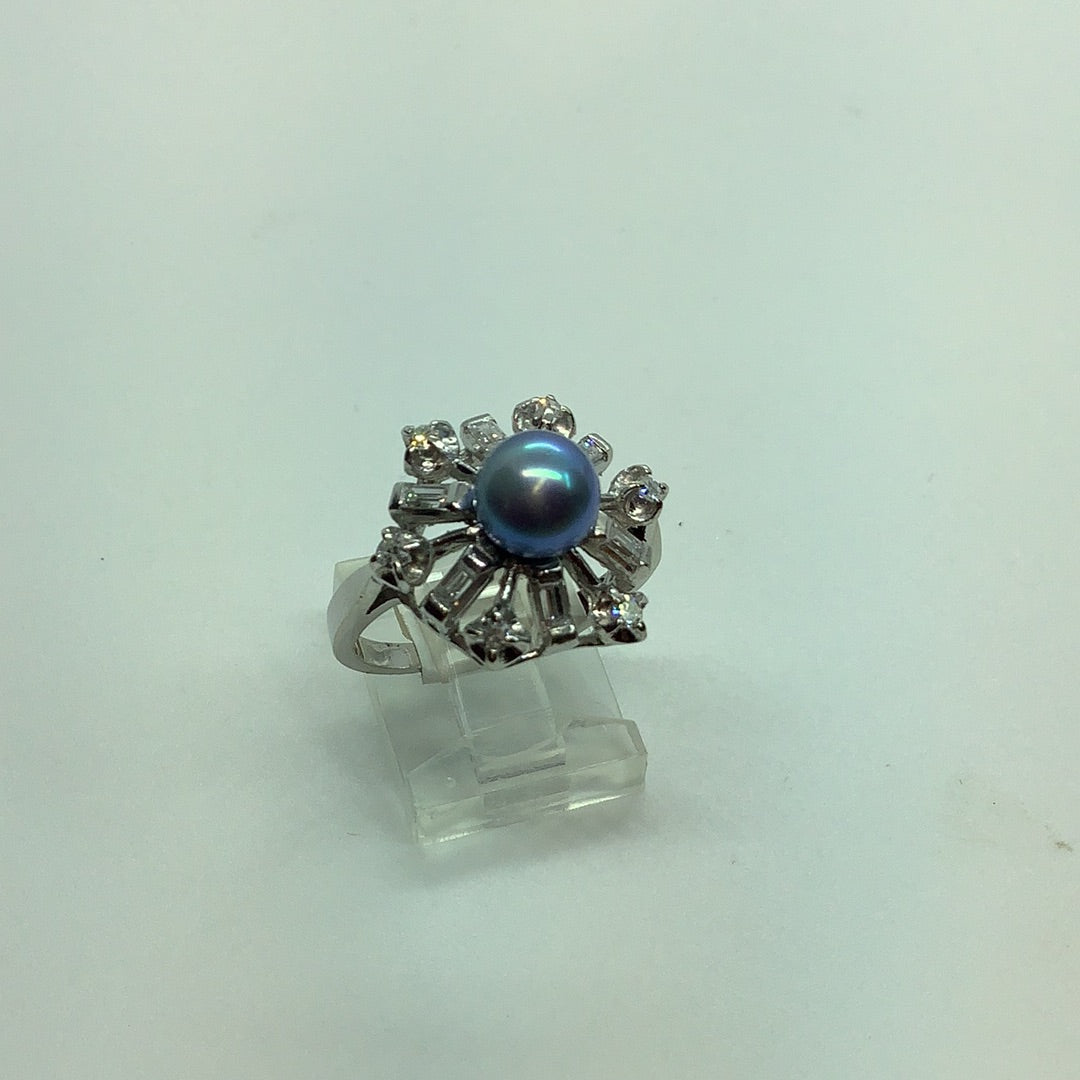 Black pearl and diamond ring