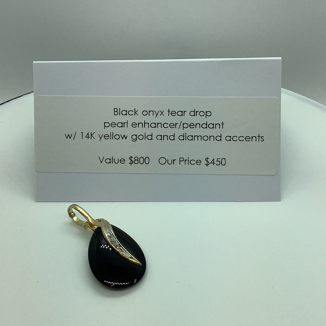 Black onyx and diamond pendant