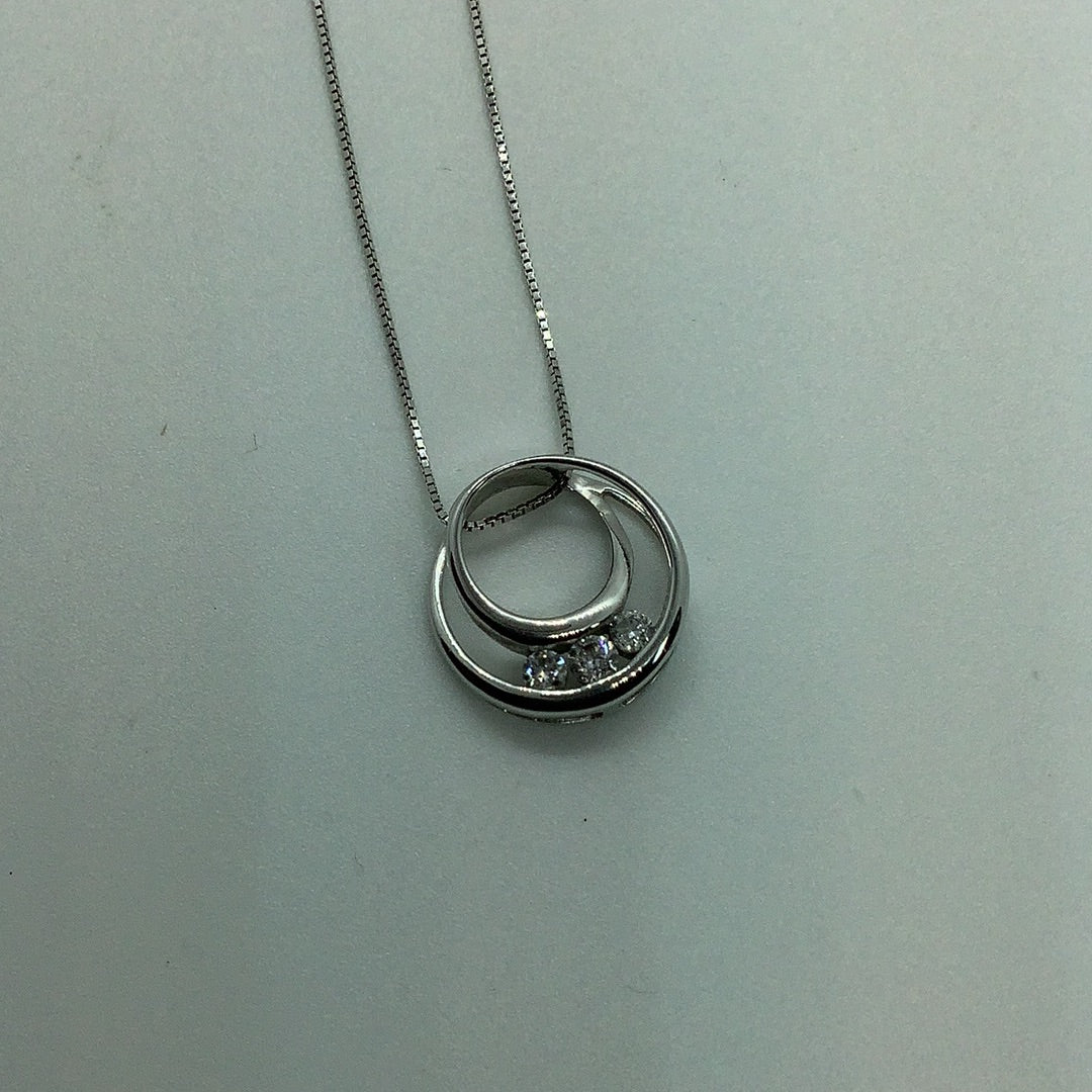 Diamond accented swirl pendant