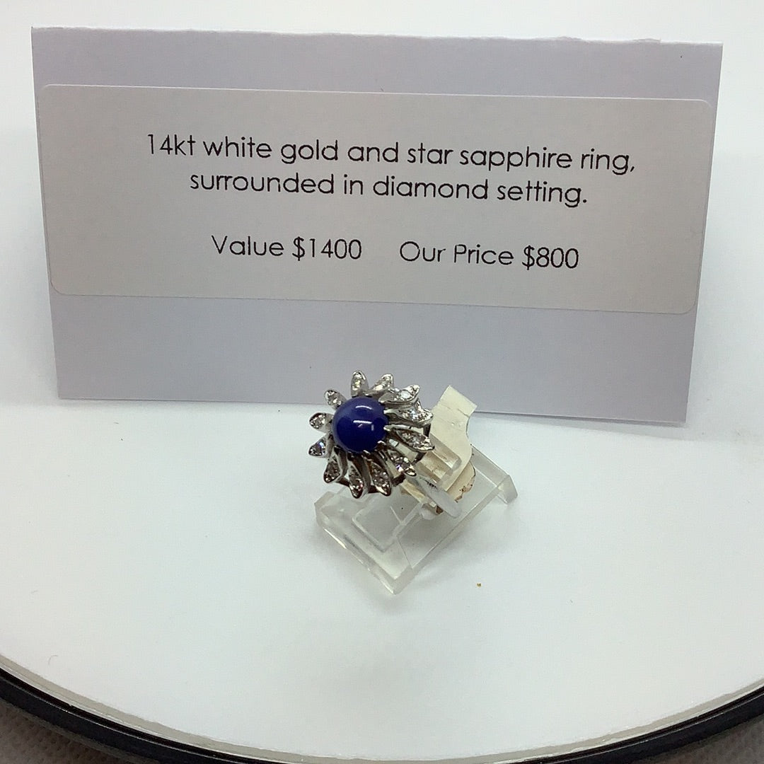 Blue star sapphire and diamond ring