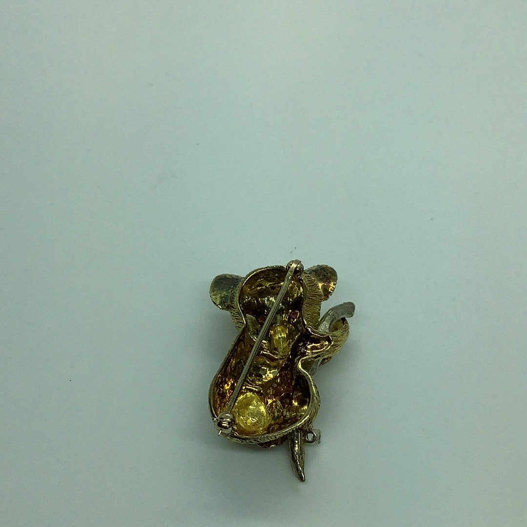 18 kt Panda and Ruby pin