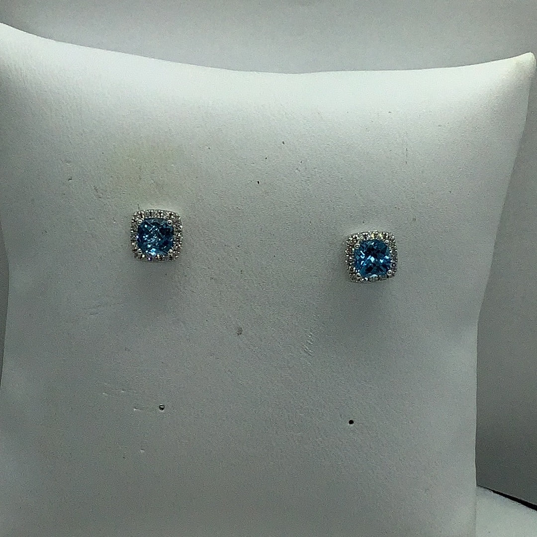 Blue topaz w/diamond halo earrings