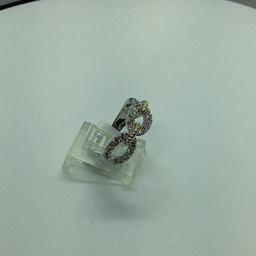 Diamond and gold link ring