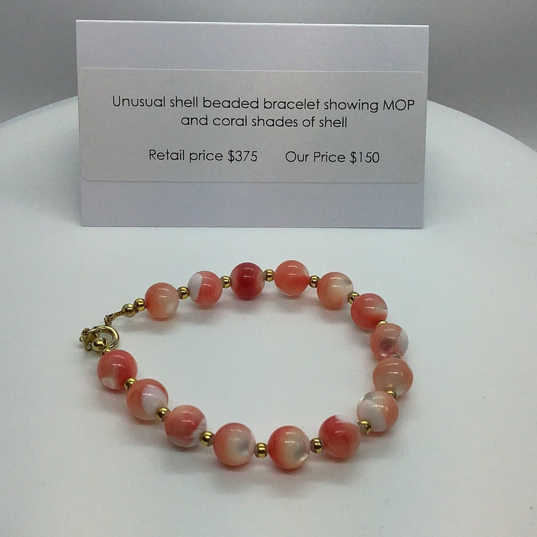 Coral toned Shell bead bracelet