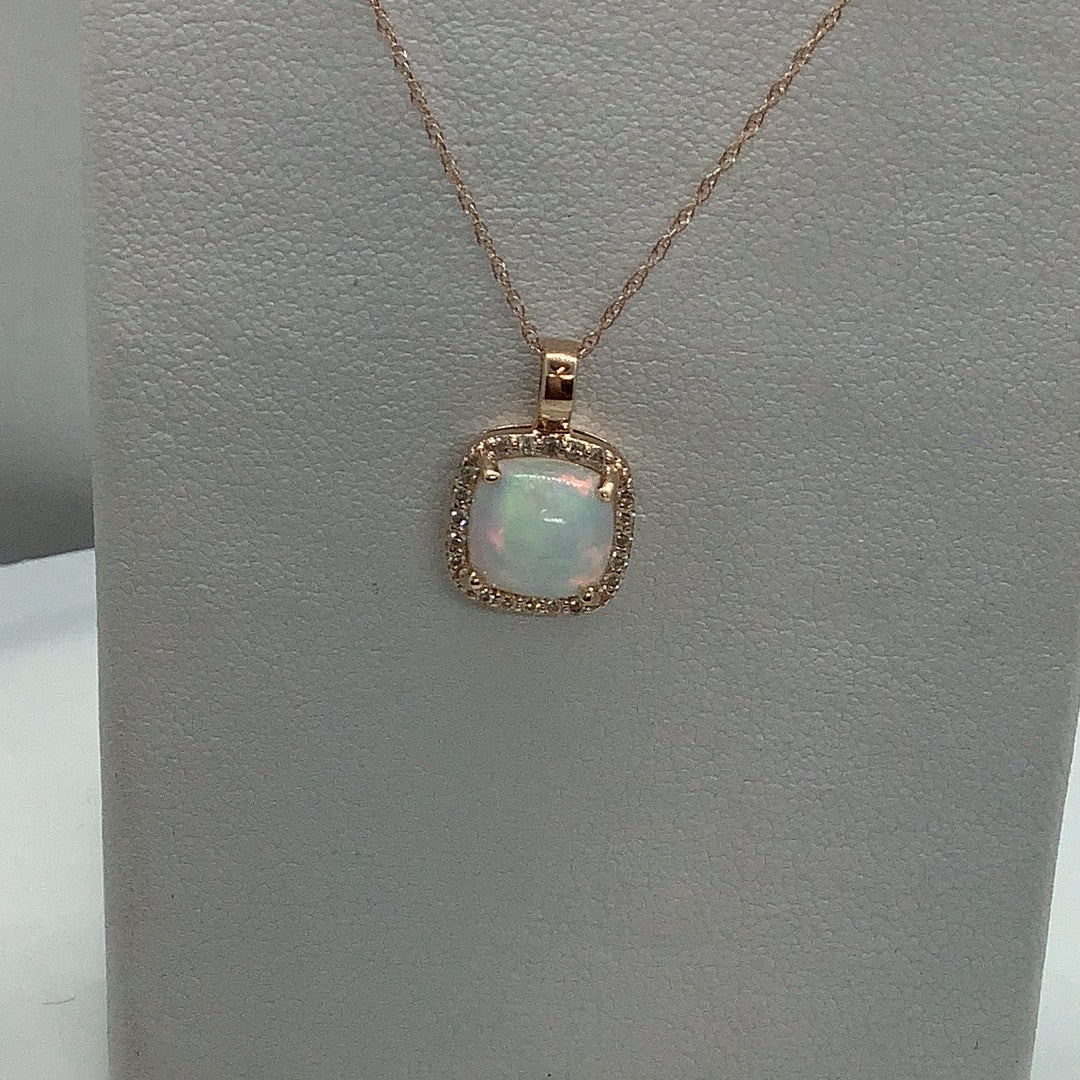 Opal and diamond pendant