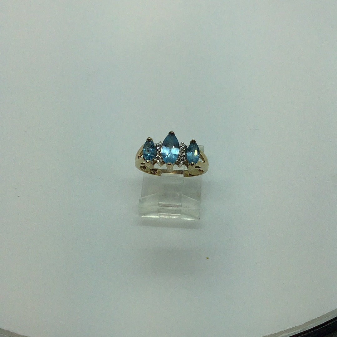 Blue topaz and diamond ring