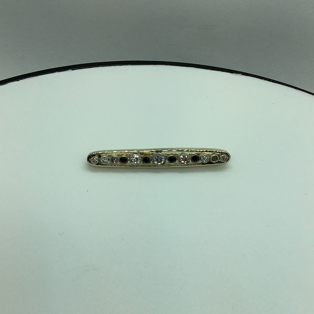 Diamond and sapphire bar pin