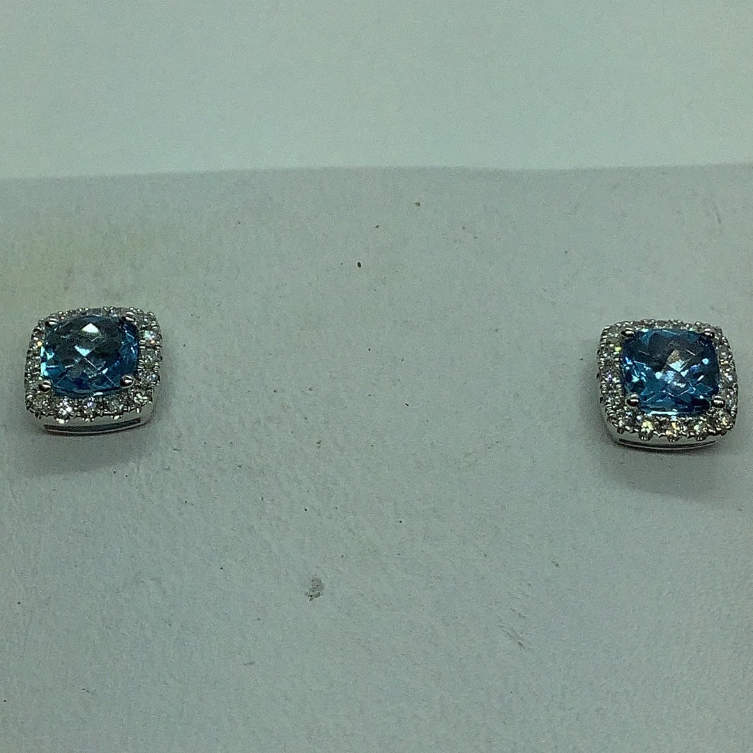 Blue topaz w/diamond halo earrings