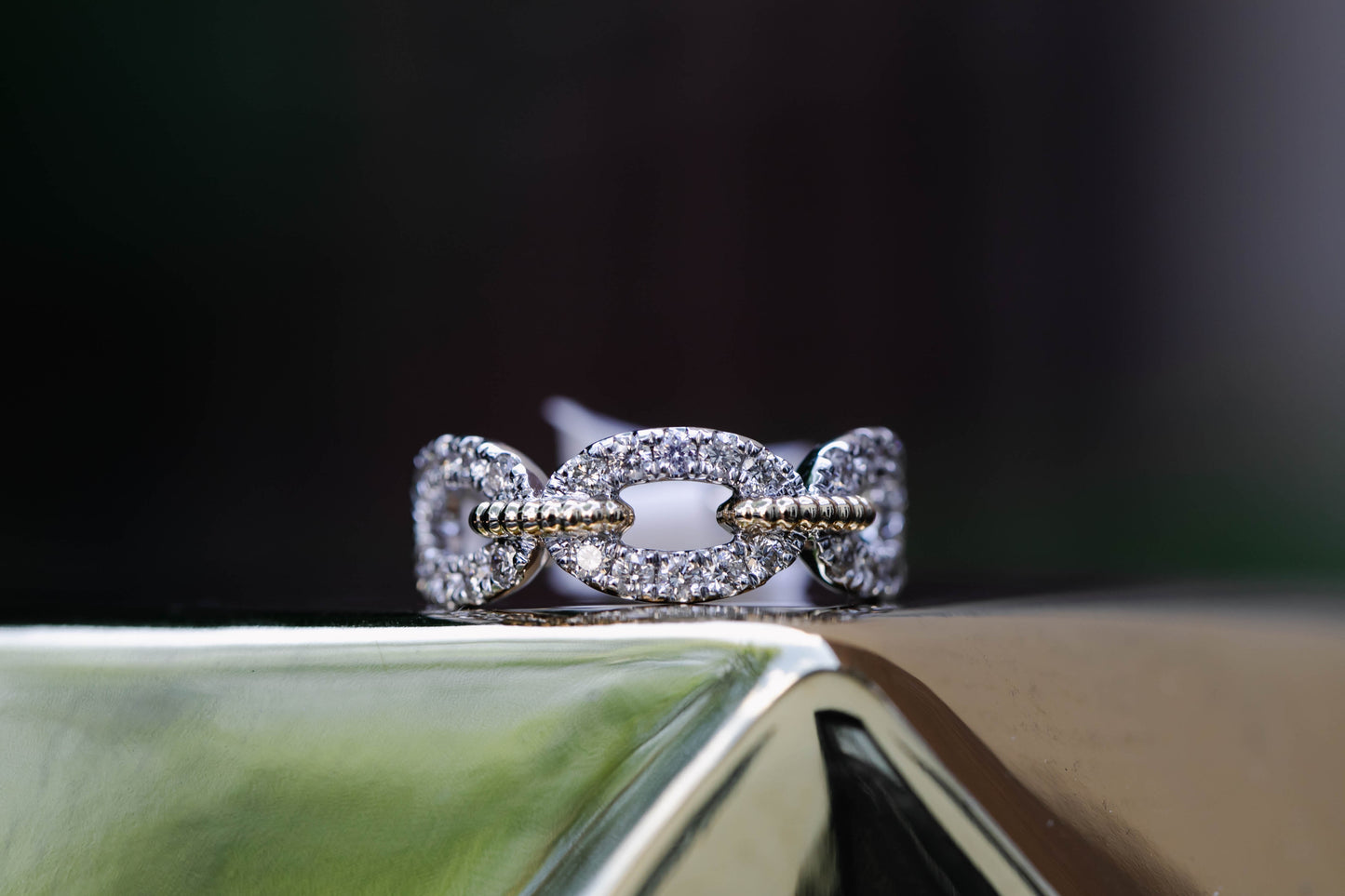 Diamond and gold link ring
