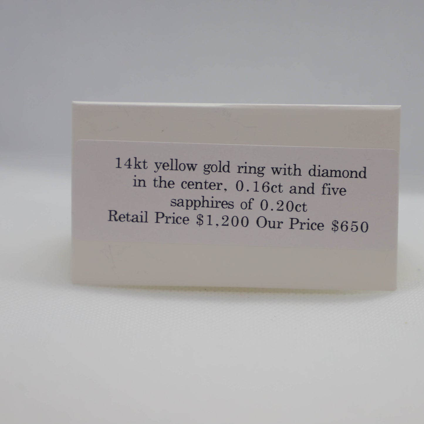 Yellow gold sapphire and diamond cluster ring