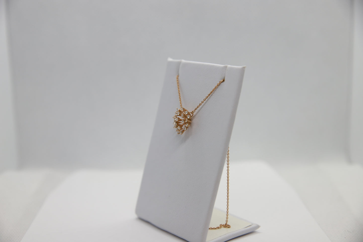 Rose gold cluster pendant