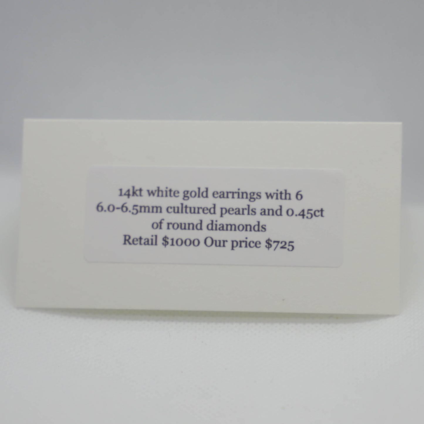 White gold pearl and diamond earring