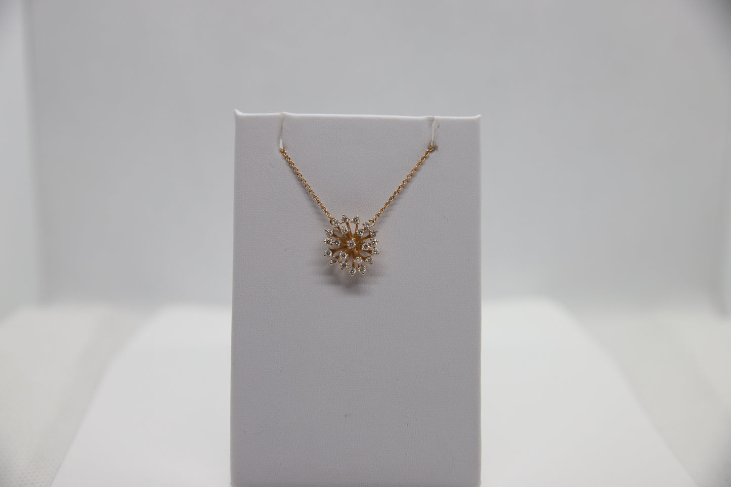 Rose gold cluster pendant