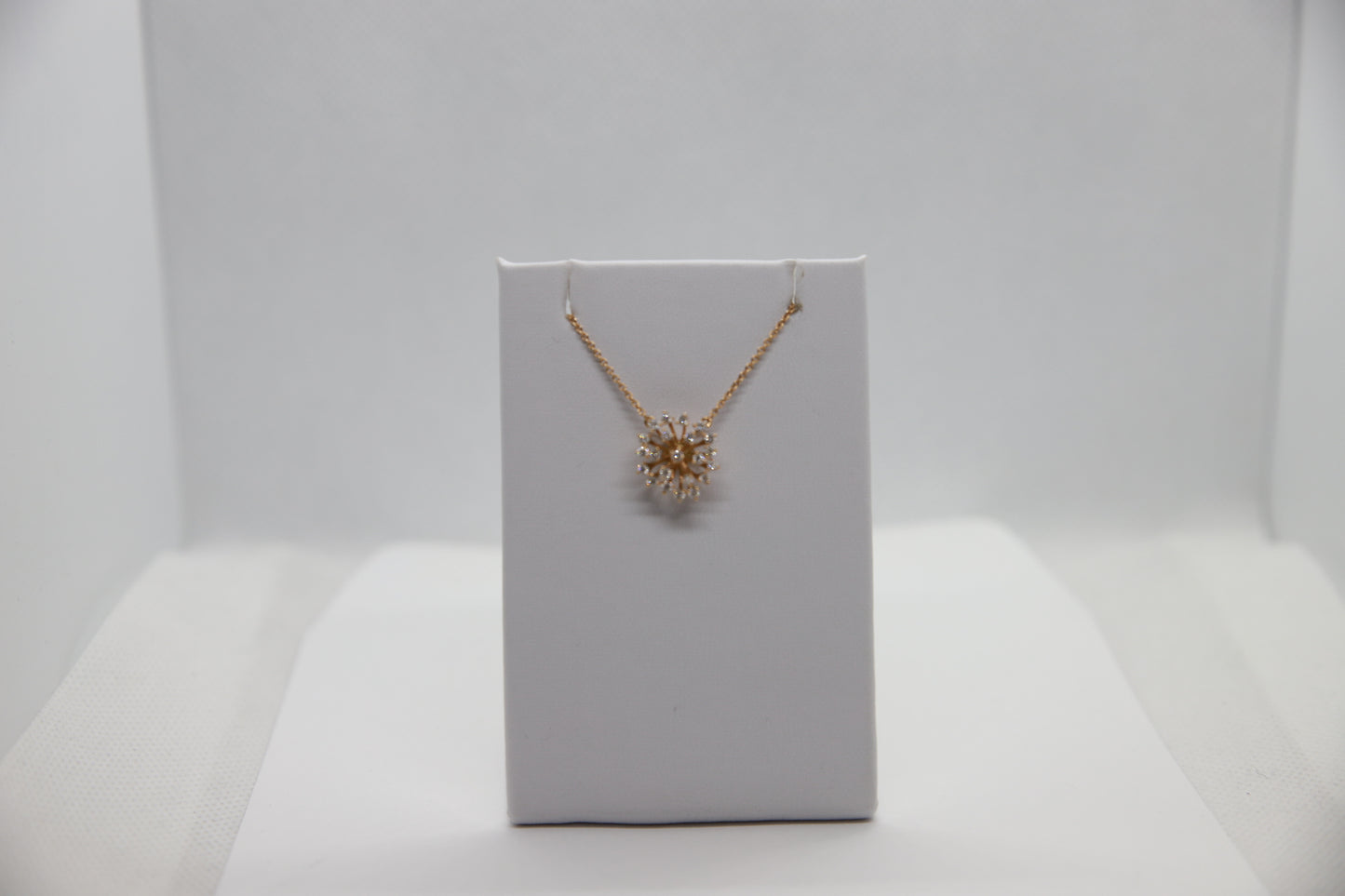 Rose gold cluster pendant