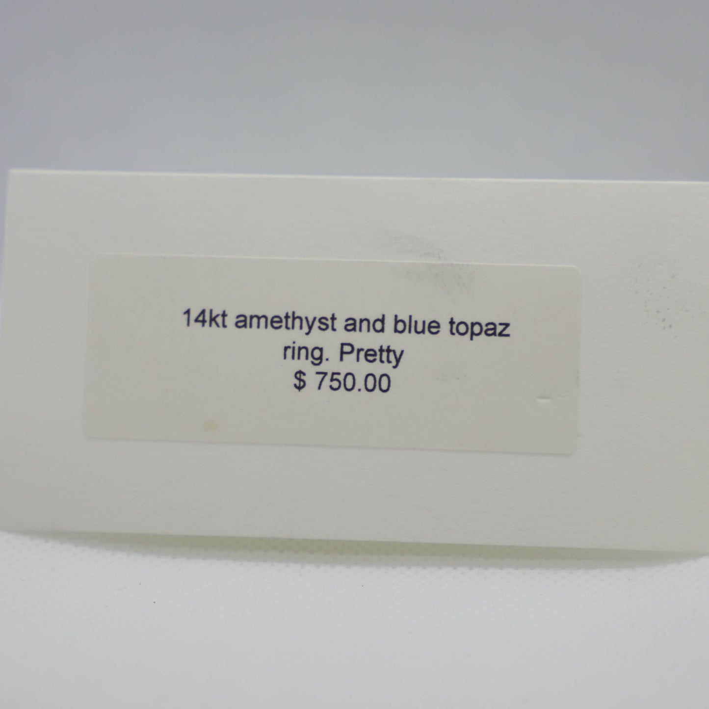 Yellow gold amethyst and blue topaz ring