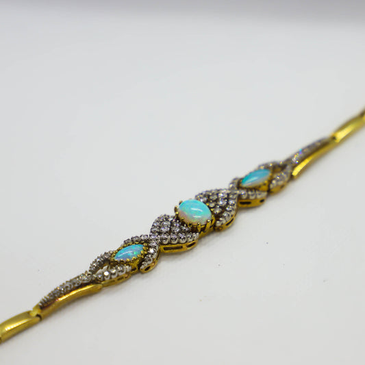 Yellow gold opal bracelet