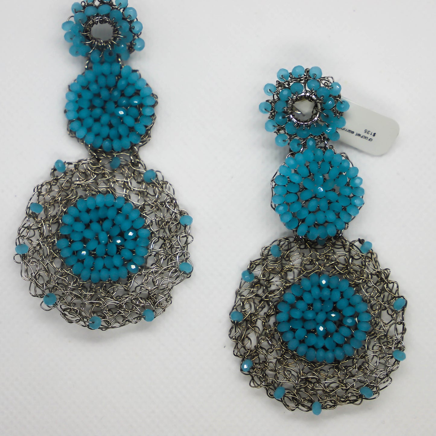 Hand crocheted circle drop earrings with light blue crystal accents