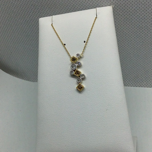 Fancy yellow diamond pendant