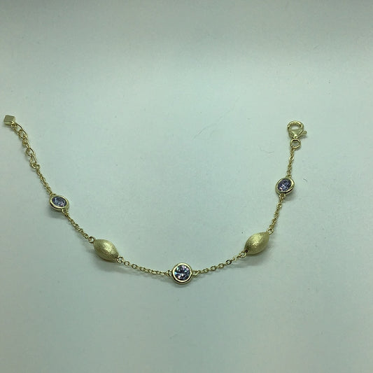 Gold over sterling station bracelet