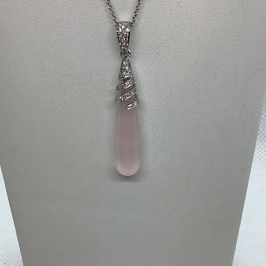 Rose quartz and diamond pendant