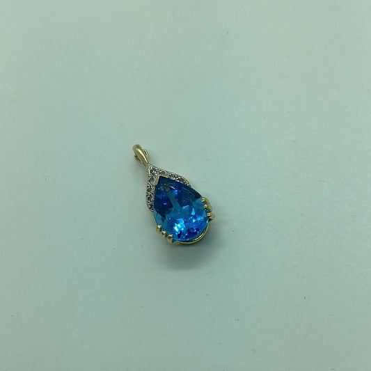 Blue topaz and diamond pendant