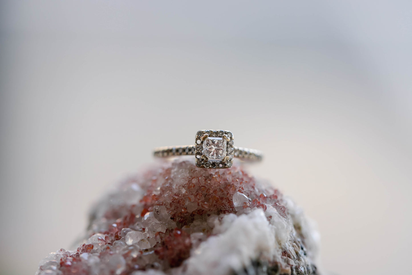 Halo style engagement ring