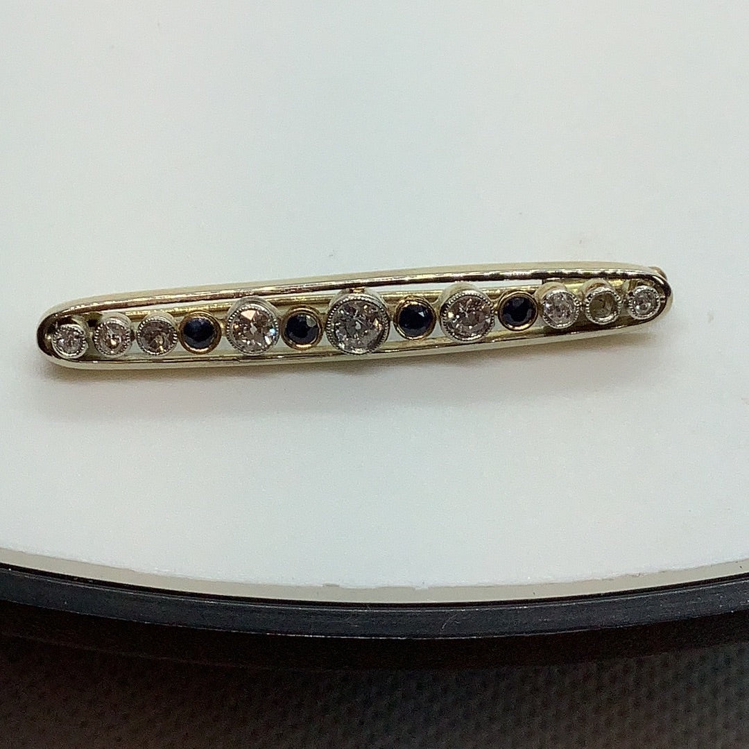 Diamond and sapphire bar pin