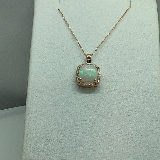 Opal and diamond pendant