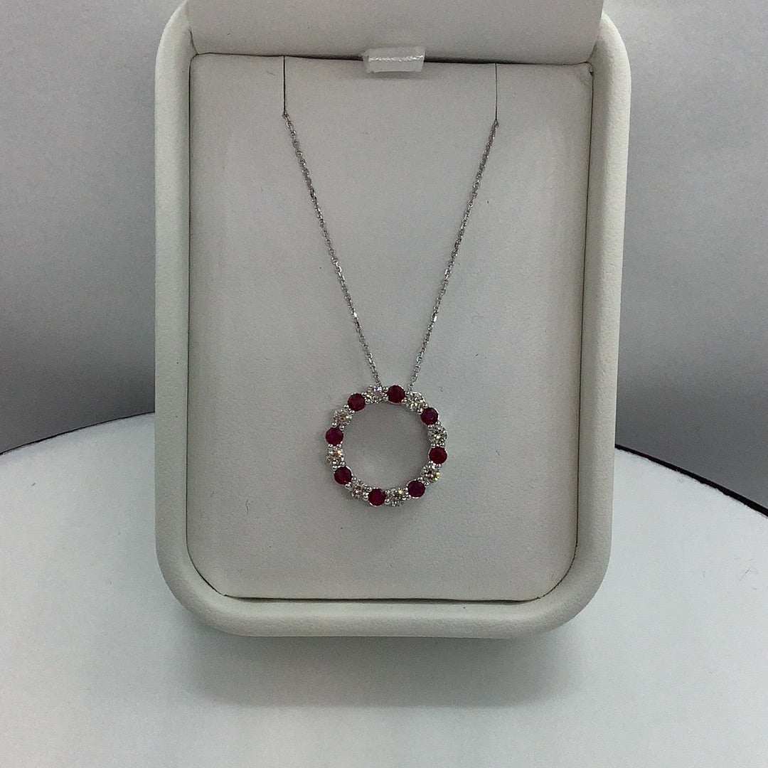 Ruby and diamond circle pendant