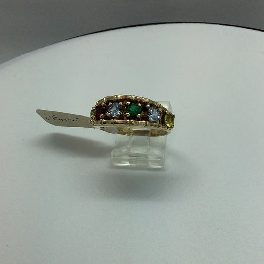 Gold band with simulated gemstones