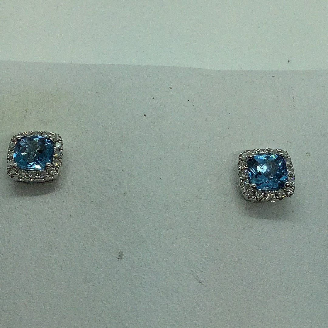 Blue topaz w/diamond halo earrings