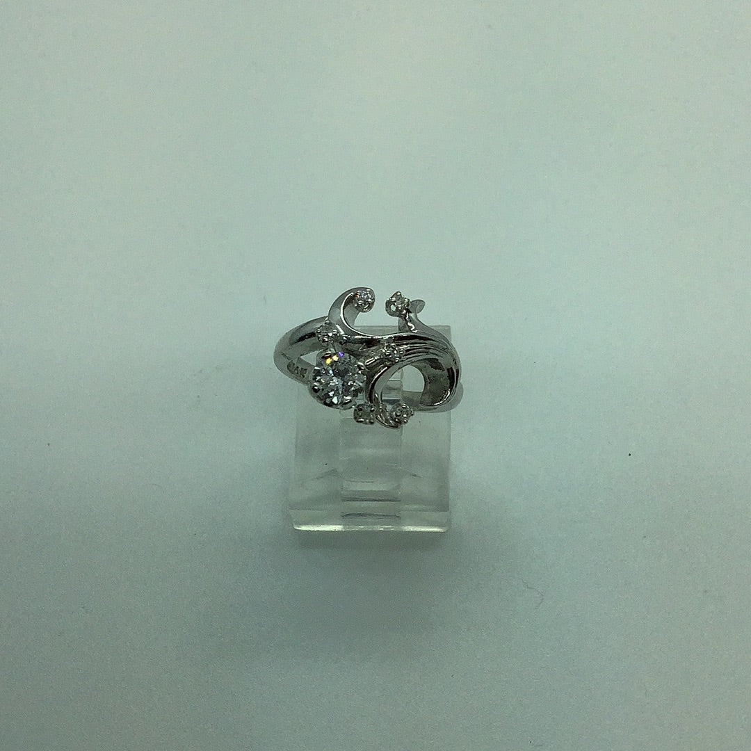 Diamond swirl ring