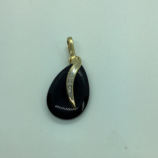 Black onyx and diamond pendant