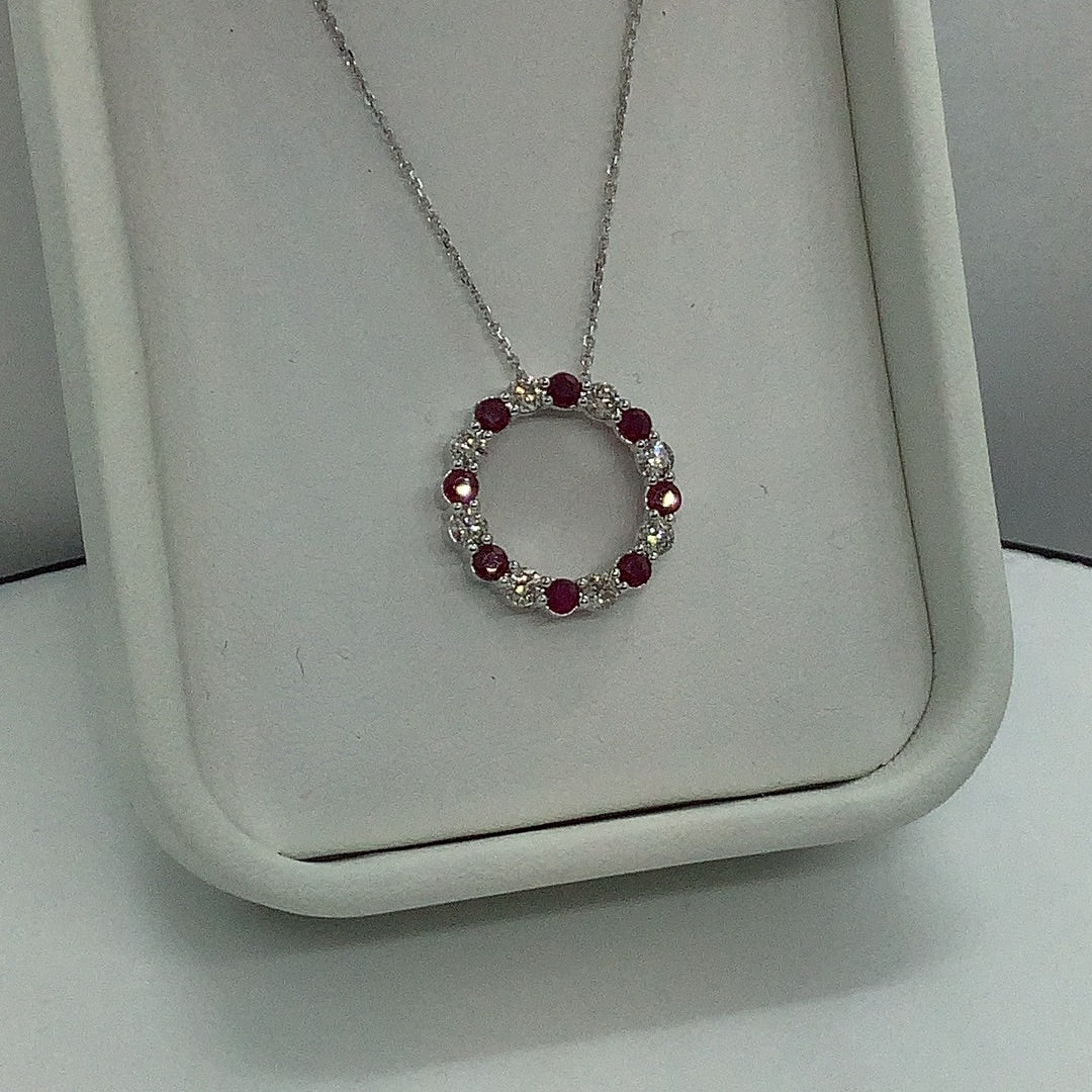 Ruby and diamond circle pendant