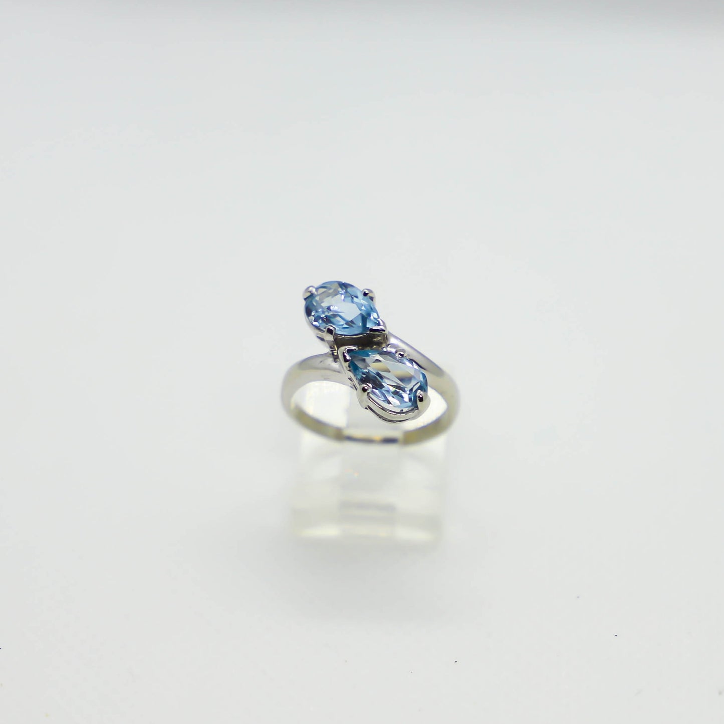 White gold, pear shaped blue topaz ring