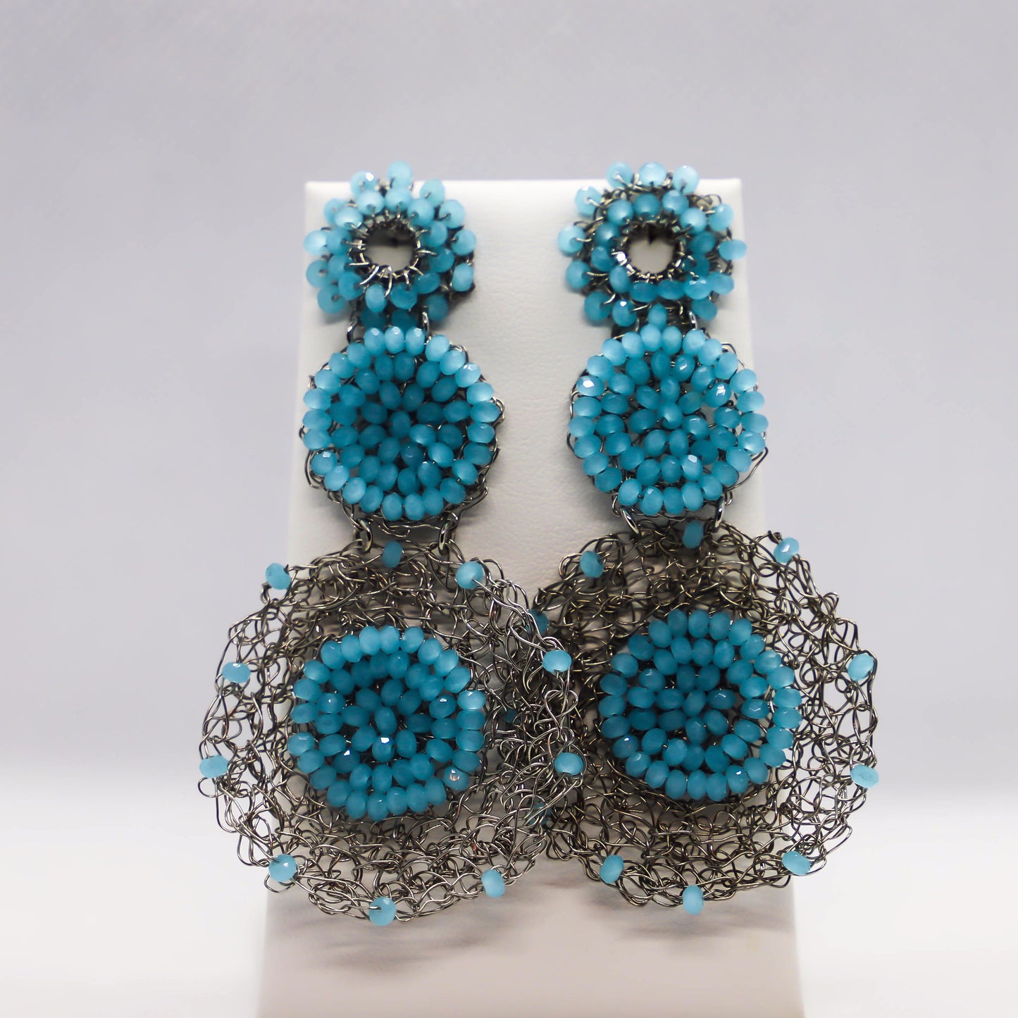 Hand crocheted circle drop earrings with light blue crystal accents