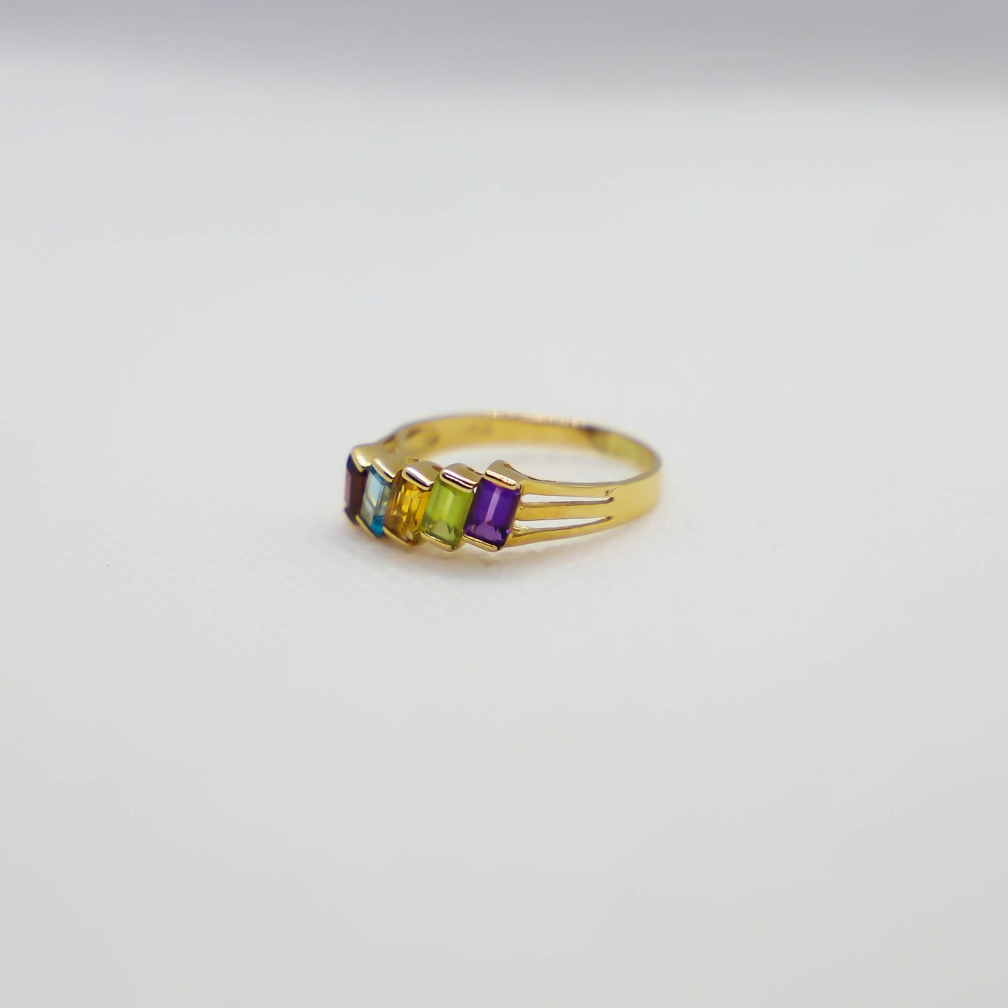 Yellow gold multi colored gemstone ring